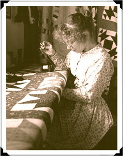 Tasha Tudor sewing a quilt