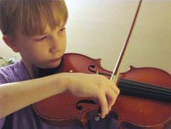 Adam Copeland plays violin