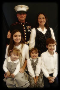 Marine Gunnery Sgt. William Kublik, his wife, Christina, and their homeschooled children.