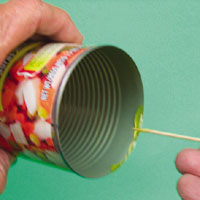 Spread the epoxy on the inside rim of the can.